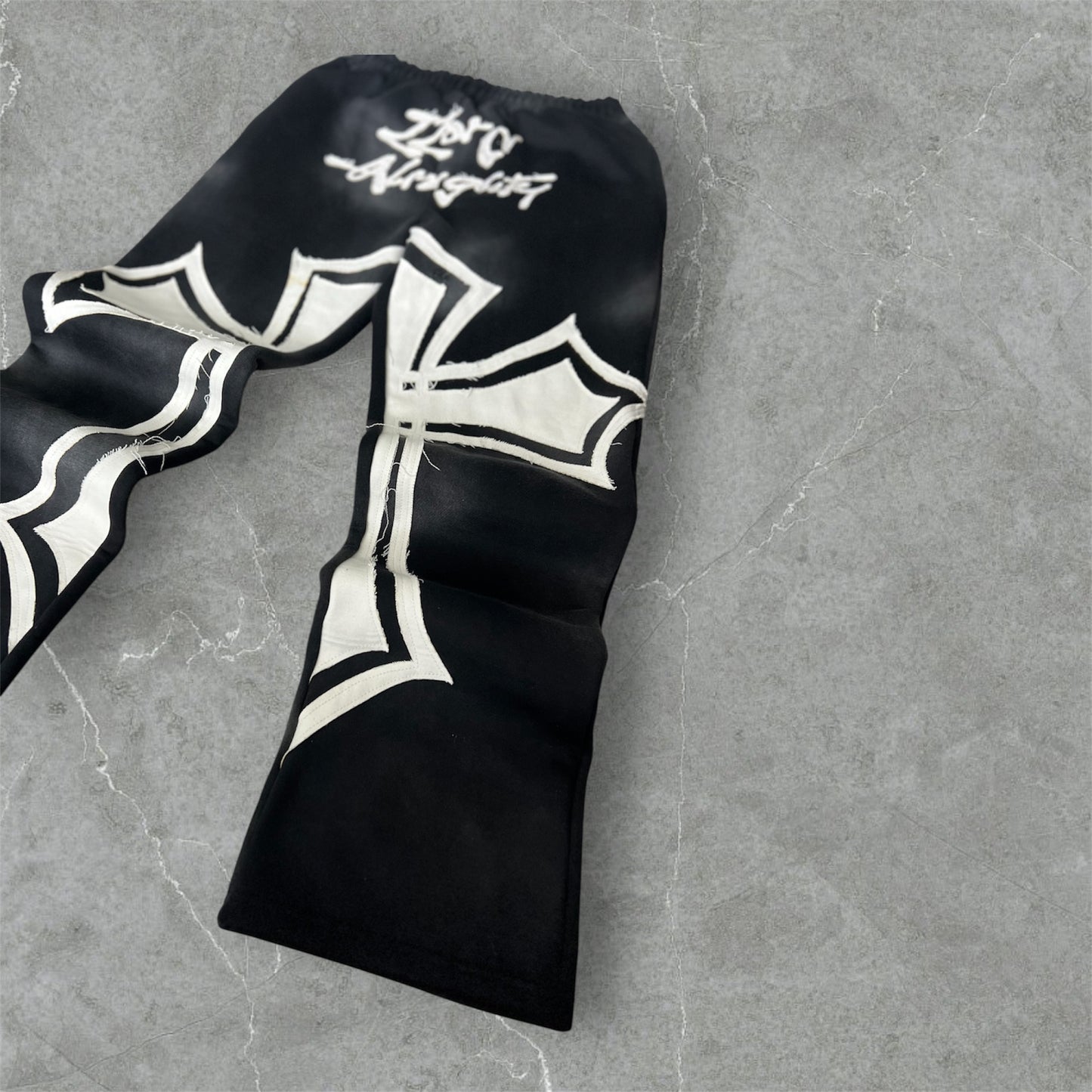 FULLY CROSSED SWEATPANTS